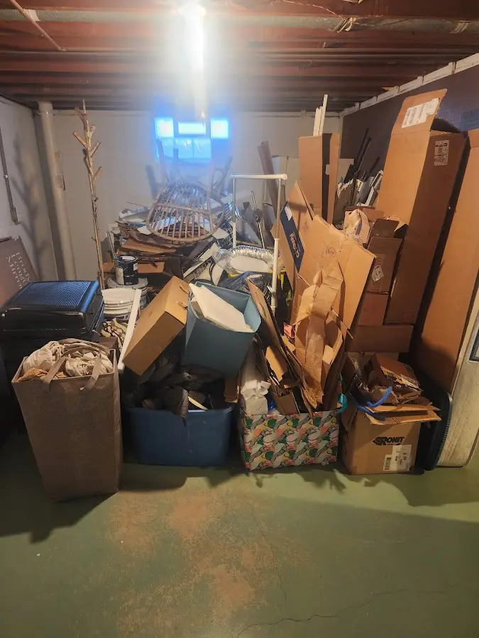 Roll-off dumpster container at job site for 2 Yard Dumpster Rental in Bessemer City